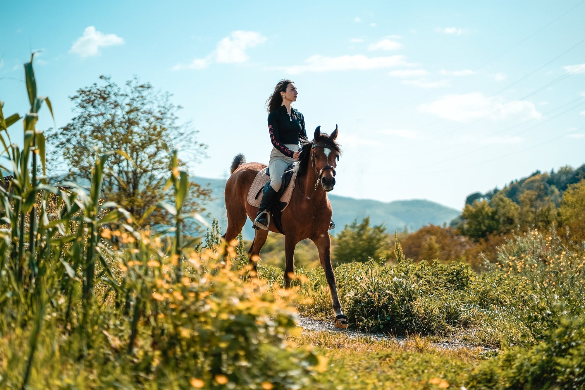 @salty.monica riding in Italy with Renegade Hoof Boots